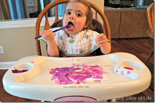 toddler valentine art- eating paint