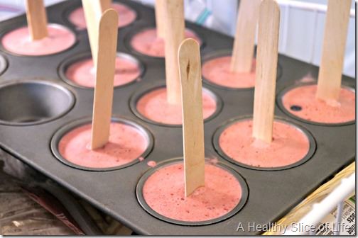 toddler friendly hidden berry cherry frozen yogurt pops- adding sticks